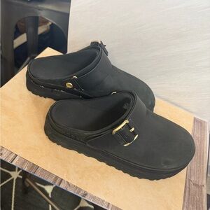 UGG Black Mules with Gold Buckle